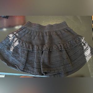 A black aerie skirt.